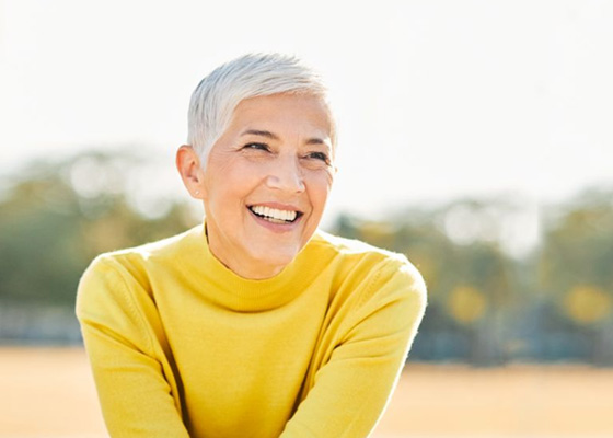 Smiling senior woman with beautiful teeth