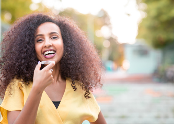 Patient in Garner smiling with clear aligners