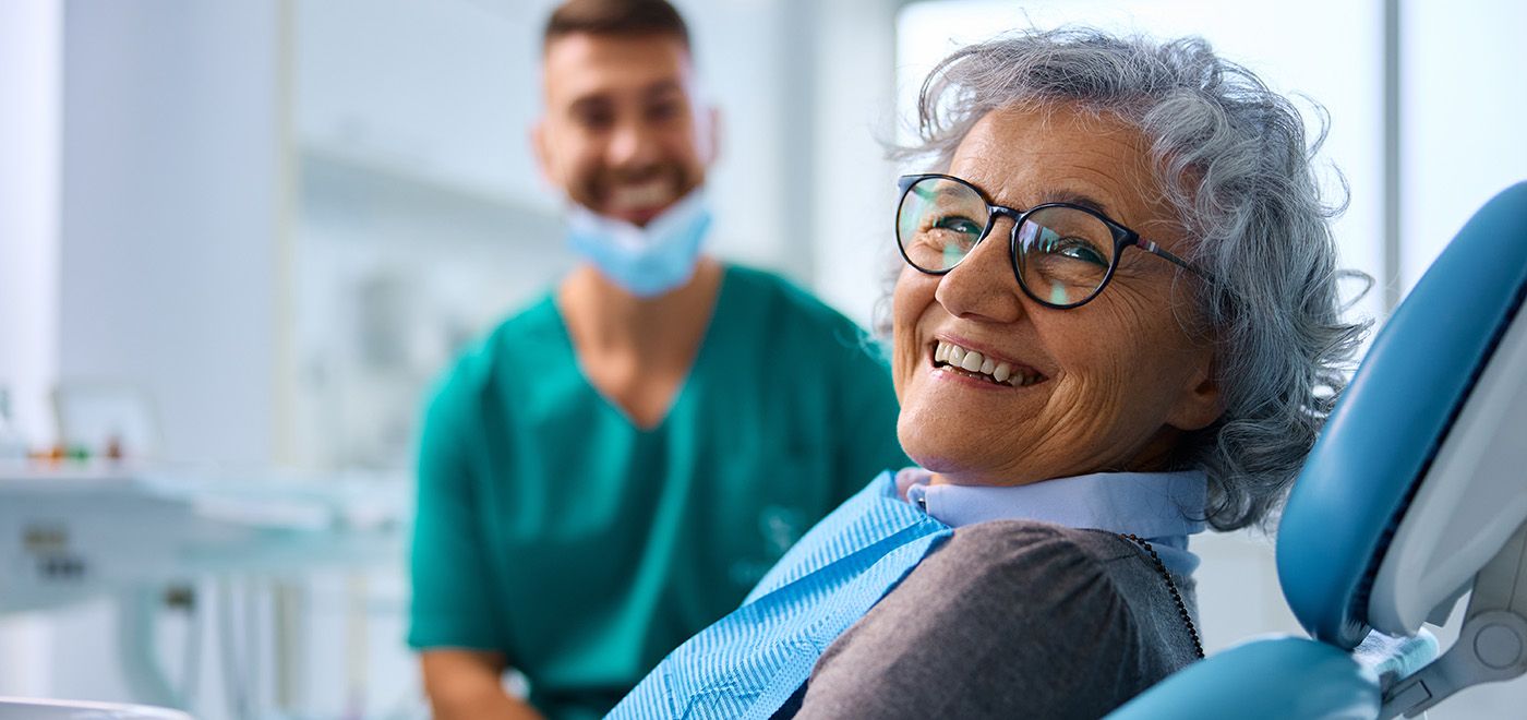 Woman with dentures in Garner