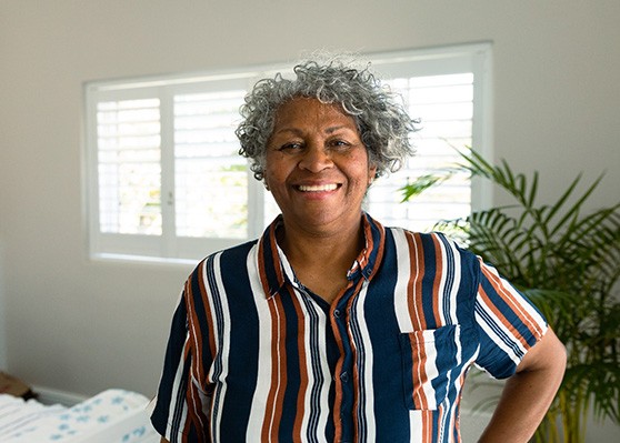 Woman showing off her complete smile