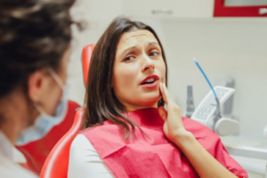 Patient explaining the details of her oral bump to her dentist