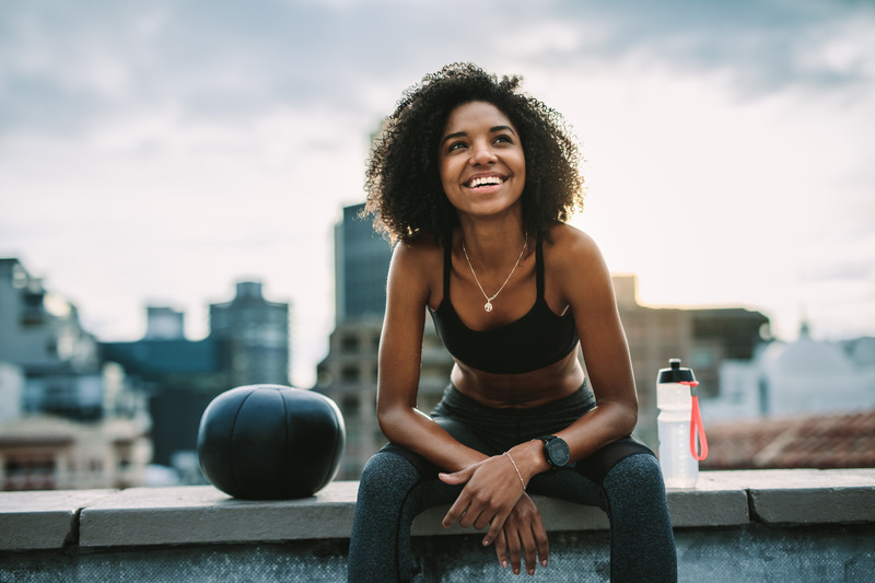 Patient with good dental health smiling after exercise